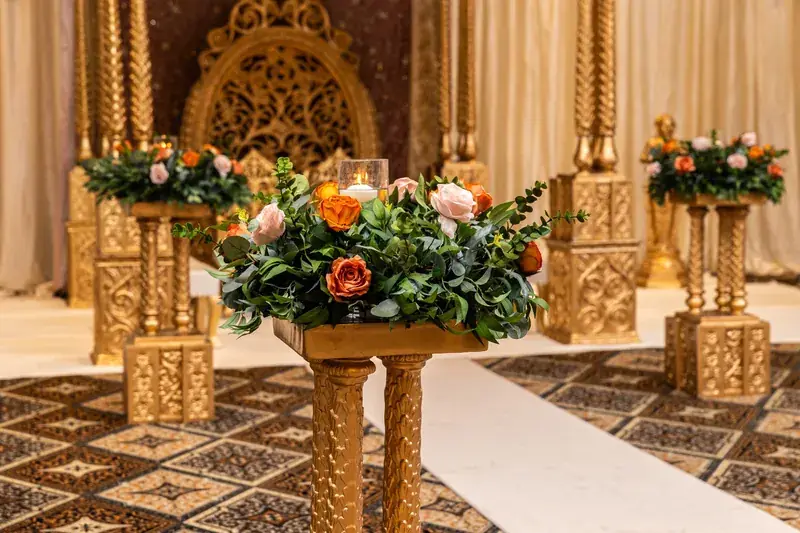 Floral pedestal beside the Shreya Mandap