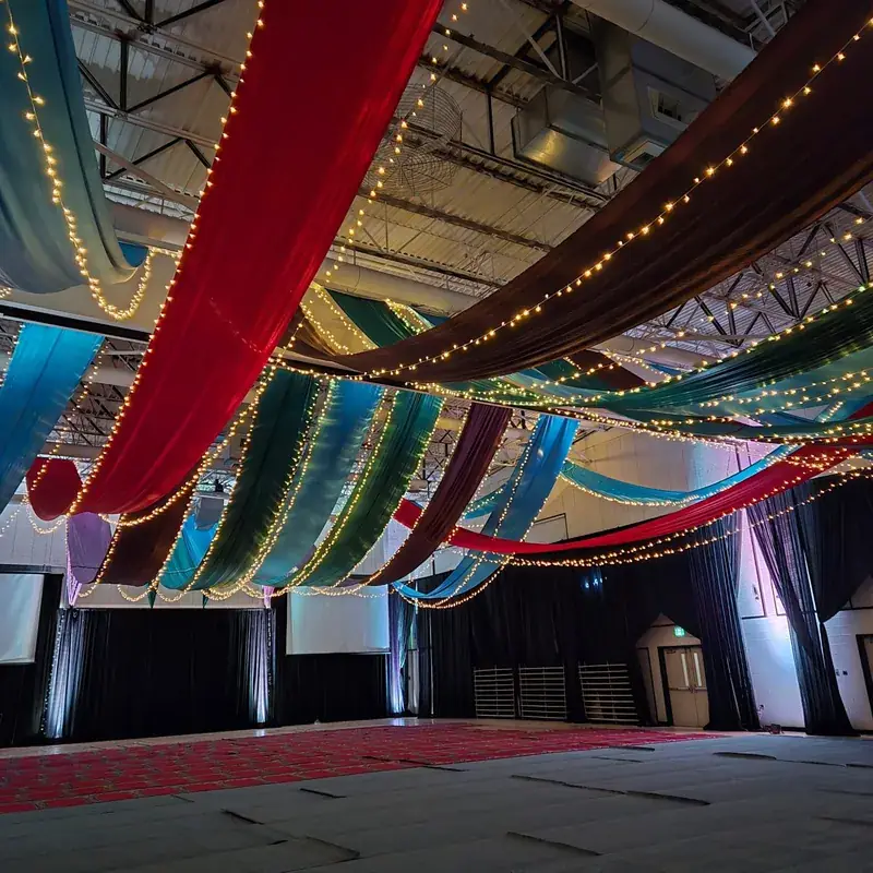 Red, green and gold ceiling draping for a cultural event